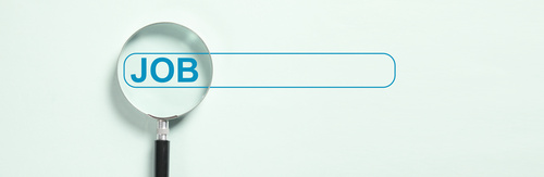 adobestock_483818684.copy.jpeg (Magnifying glass and the inscription: Job search symbol)